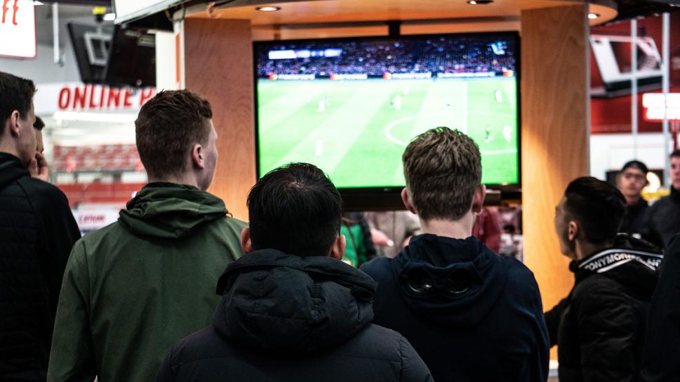 Football match on TV ar12092019