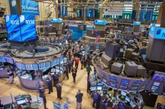 Wall Street reste prudente face aux menaces douanieres de Trump 696x464 1
